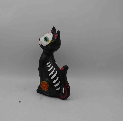 Halloween skull sculptures, Halloween celebrations, cat sculptures