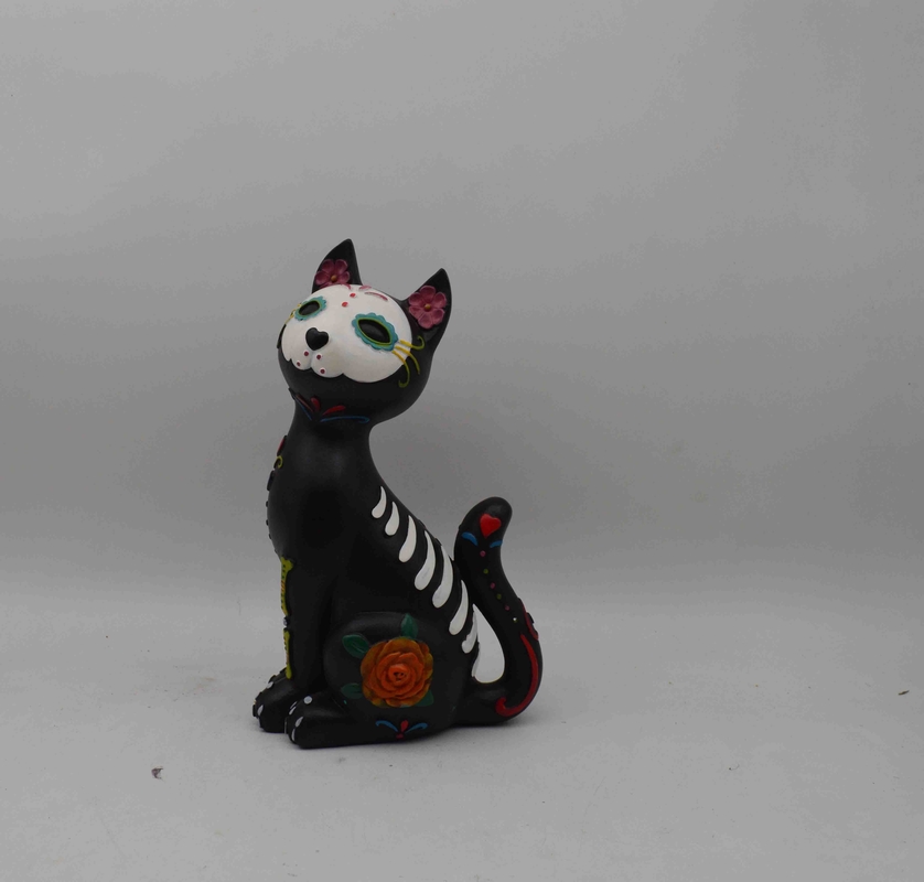Halloween skull sculptures, Halloween celebrations, cat sculptures